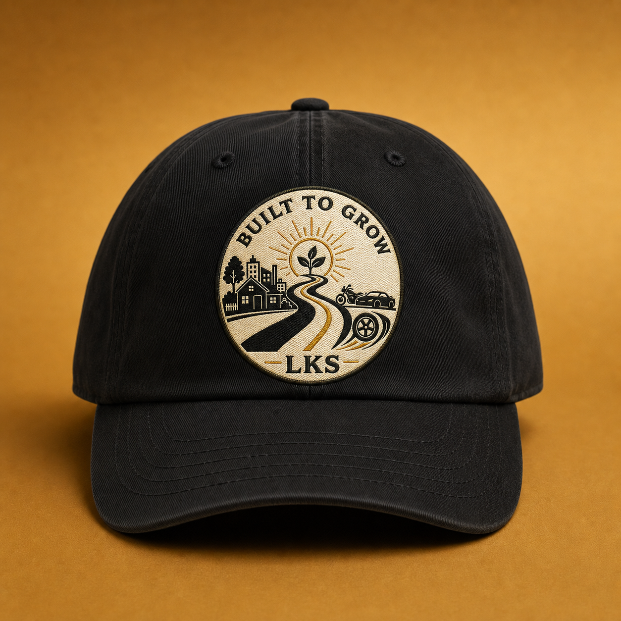 Built in the Community Dad Hat in black — front view with LKS Built to Grow embroidered patch